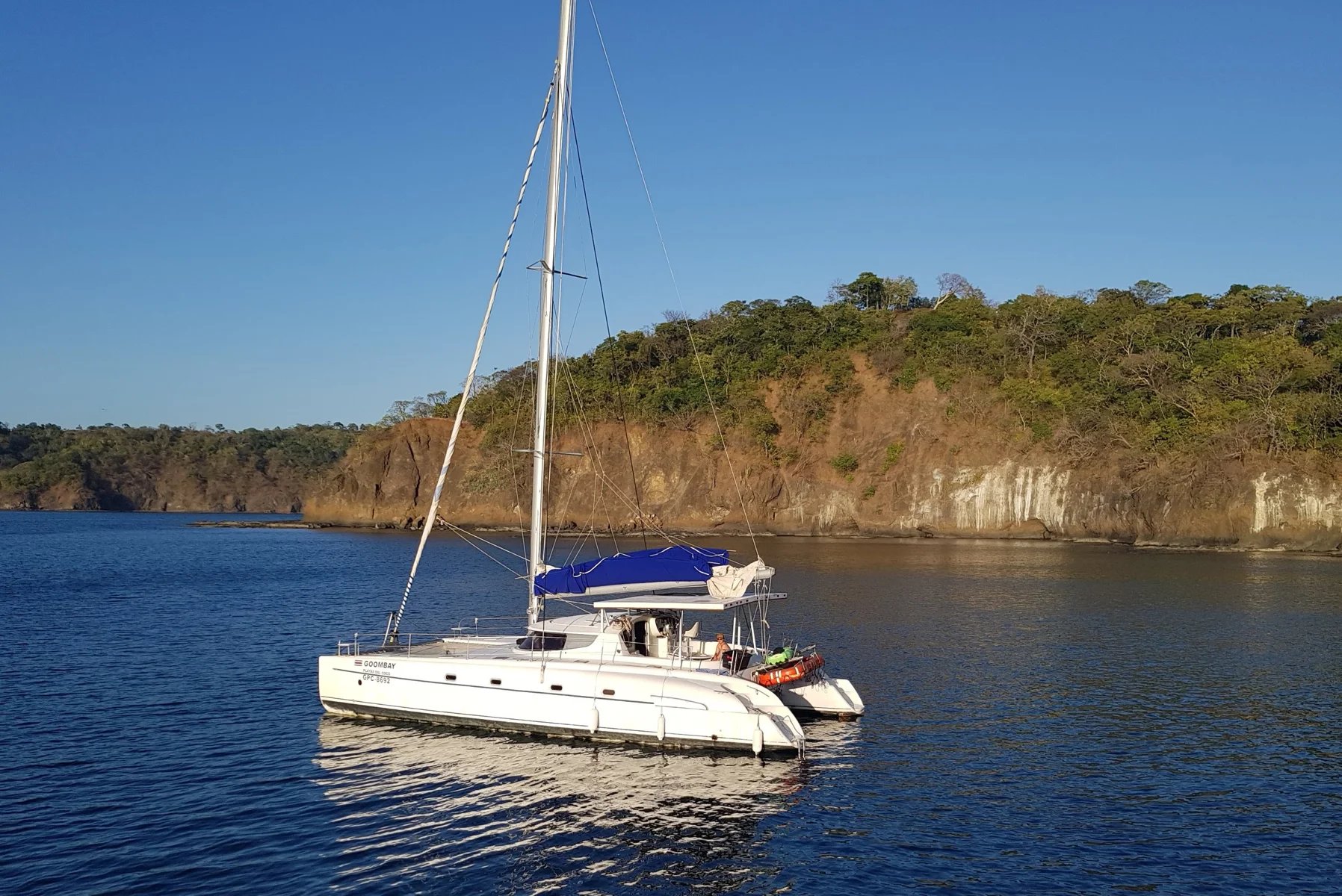 Boats anchored in the calm turquoise bay of Playa Garza, Guanacaste, Costa Rica